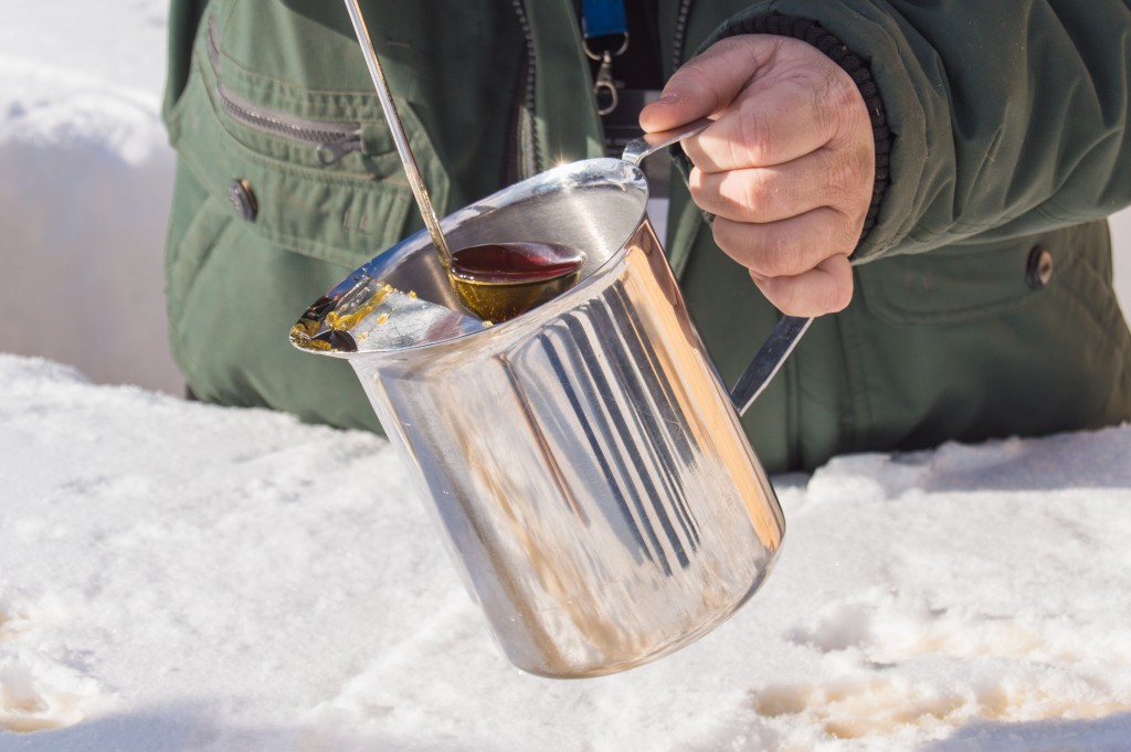 Making maple taffy on snow