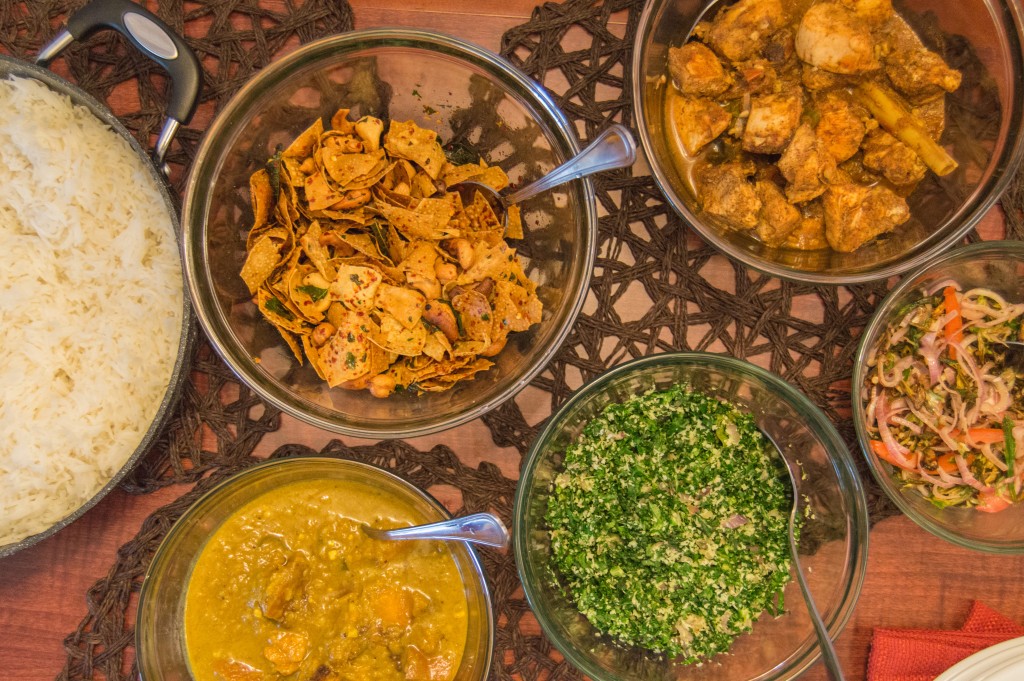 Sri Lankan ingredients for rice and curry displayed on a kitchen counter