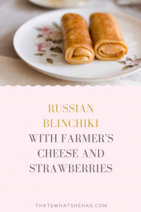 Classic Russian Blinchiki stuffed with farmer's cheese and strawberries make for a delicious breakfast! #Blini #crepes #farmerscheese #tvorog #strawberries #russianfood #russiancuisine