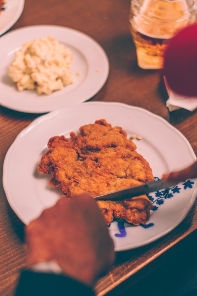 Eating Schnitzel at a local restaurant is my favourite when spending one day in Praque