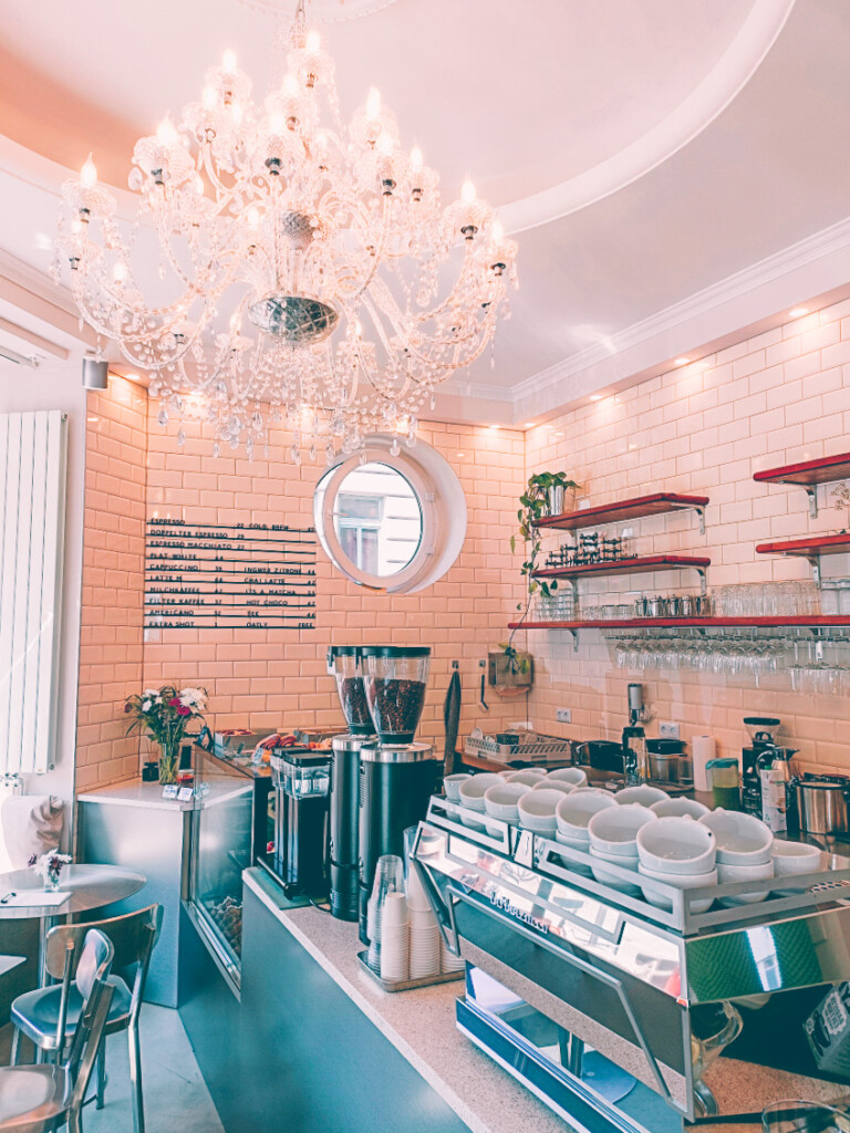 Modern interior of Instinct with a large chandelier