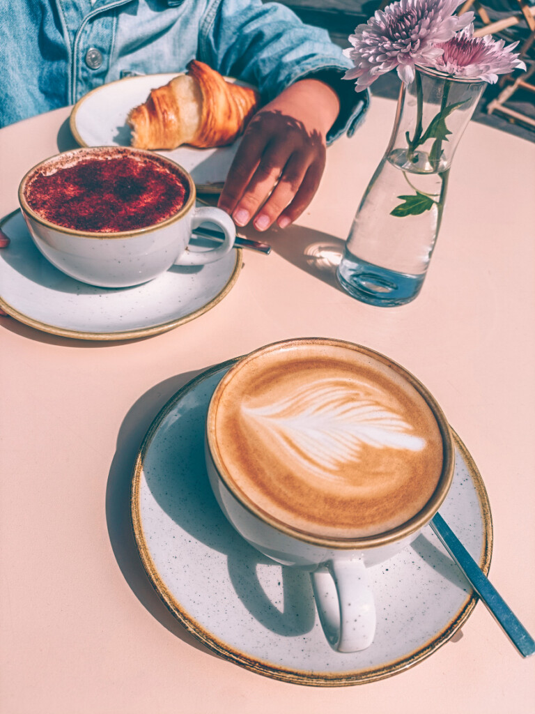 Coffee with beautiful latte art served at Vibes