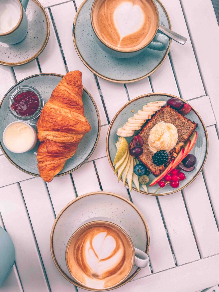 Breakfast at The Special Connection caf&eacute; with fresh croissant, fruit, and some of the best coffee in Hamburg