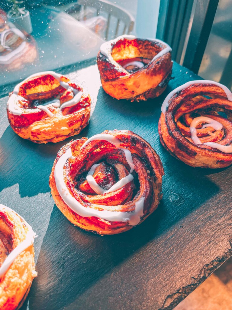 Cinnamon buns displayed at Copenhagen Coffee Lab
