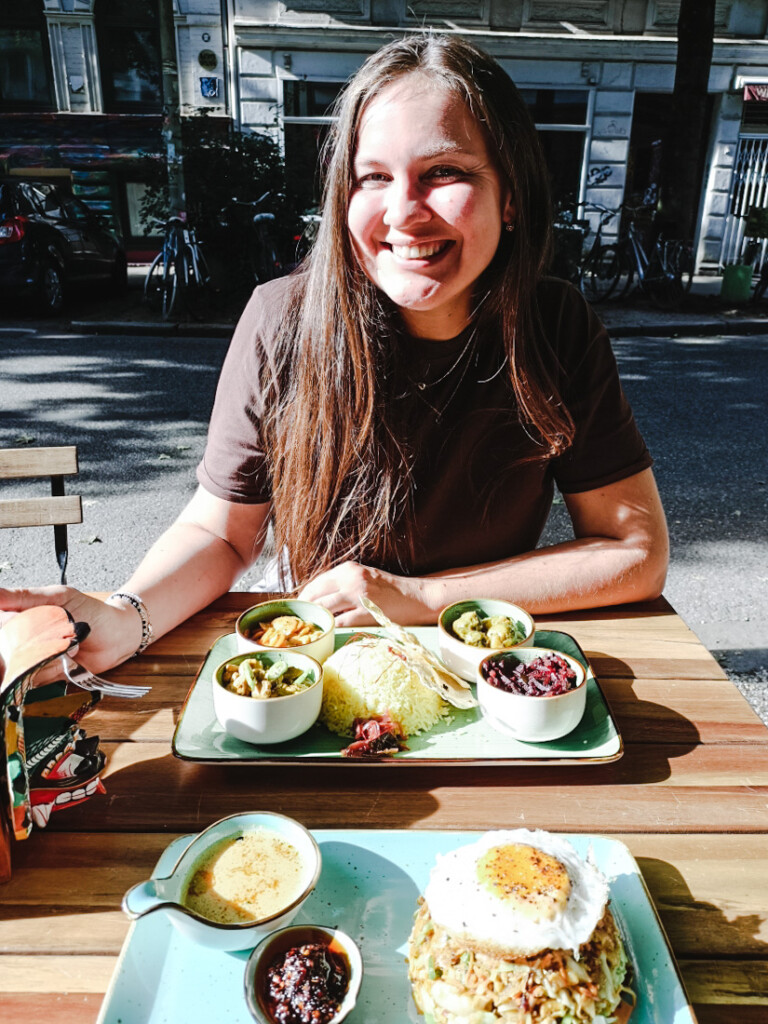 Yulia with rice and curry at Sri Lankan Street Wave