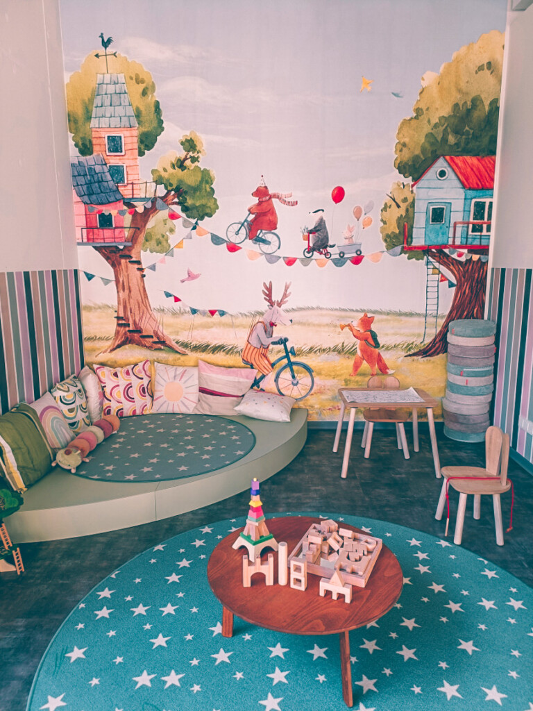 Fun colorful playroom at Lille kinder makes for a great pit stop when traveling through Hamburg with Kids