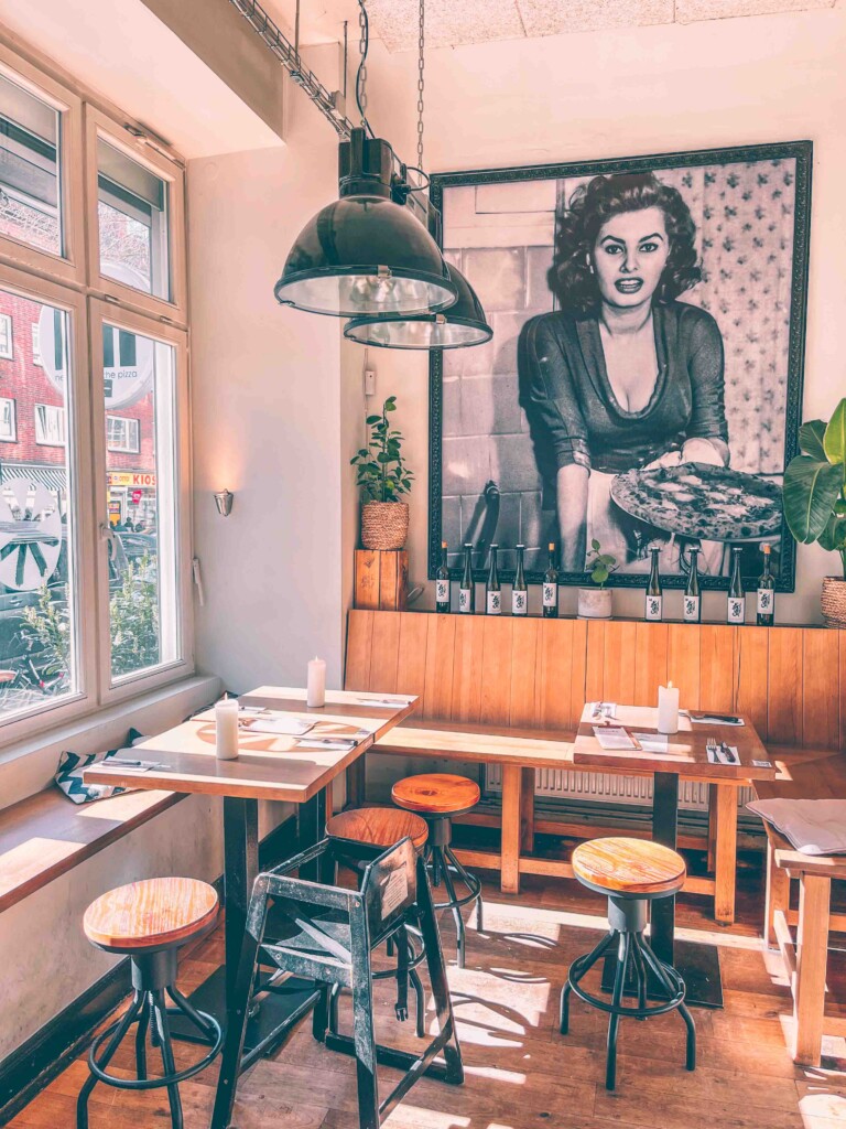 Jill Pizza interior with a portrait of Sofia Loren