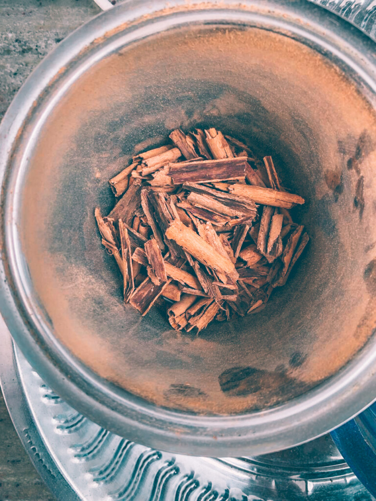 cinnamon sticks in the grinder