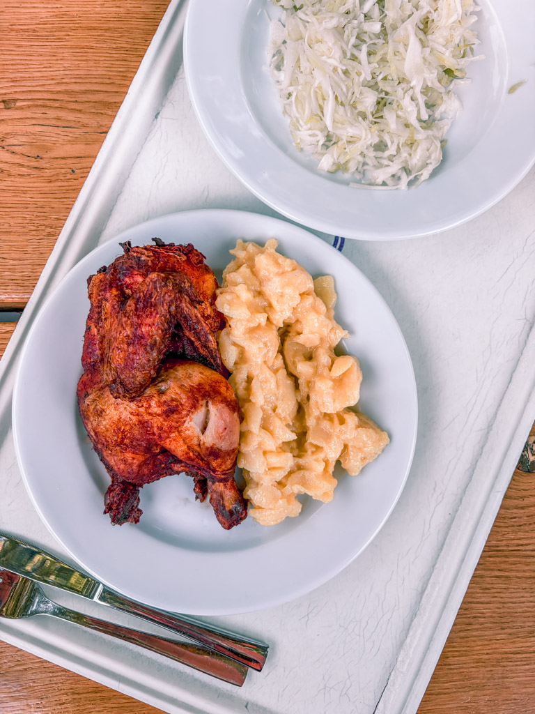 Half a chicken with potato salad and cabbage slaw at cafe am neuen see